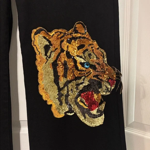 Black Wide-Leg Pants with Embroidered Designs - Picture 2 of 6